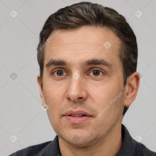 Neutral white adult male with short  brown hair and brown eyes