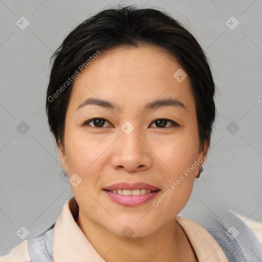 Joyful asian young-adult female with short  brown hair and brown eyes