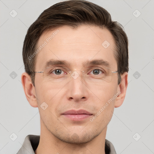 Joyful white adult male with short  brown hair and grey eyes