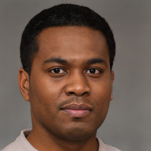 Neutral black young-adult male with short  black hair and brown eyes
