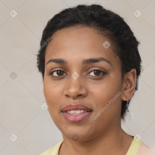 Joyful latino young-adult female with short  brown hair and brown eyes