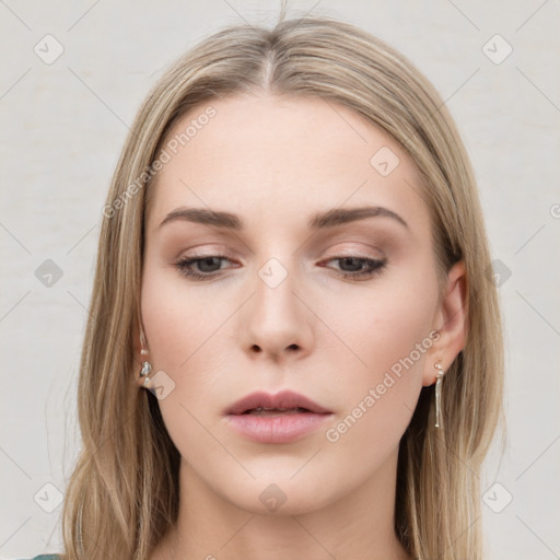 Neutral white young-adult female with long  brown hair and brown eyes