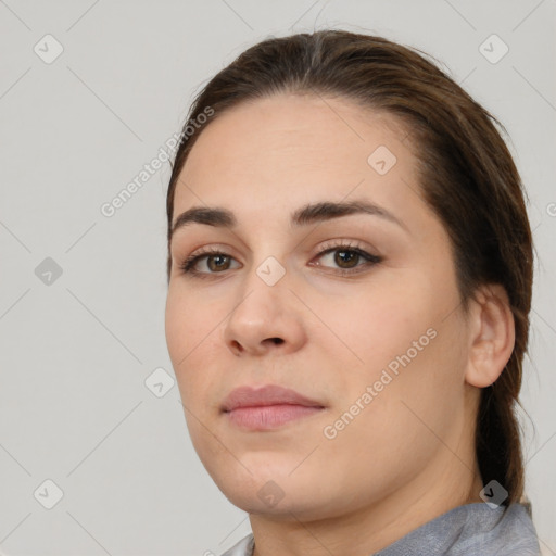 Neutral white young-adult female with medium  brown hair and brown eyes