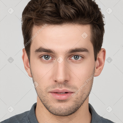 Neutral white young-adult male with short  brown hair and brown eyes