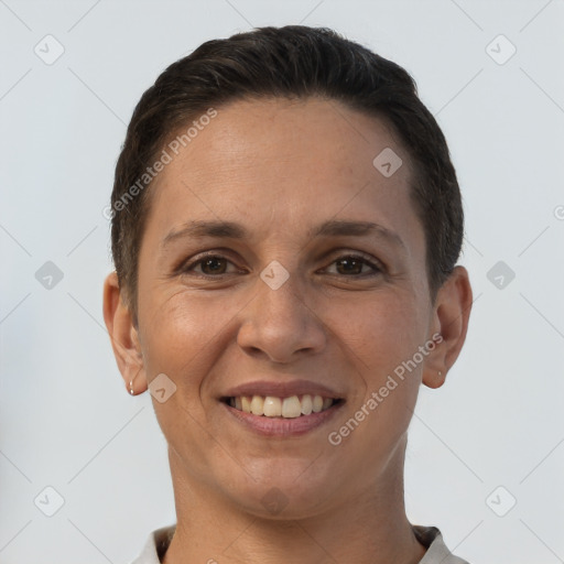 Joyful white young-adult female with short  brown hair and brown eyes