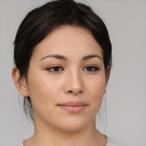 Joyful asian young-adult female with medium  brown hair and brown eyes