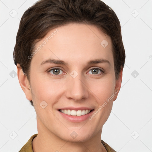 Joyful white young-adult female with short  brown hair and grey eyes