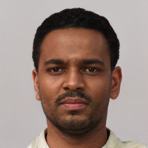 Neutral black young-adult male with short  black hair and brown eyes