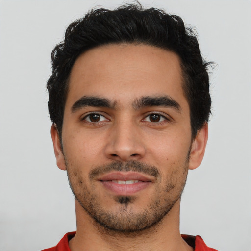 Neutral latino young-adult male with short  brown hair and brown eyes