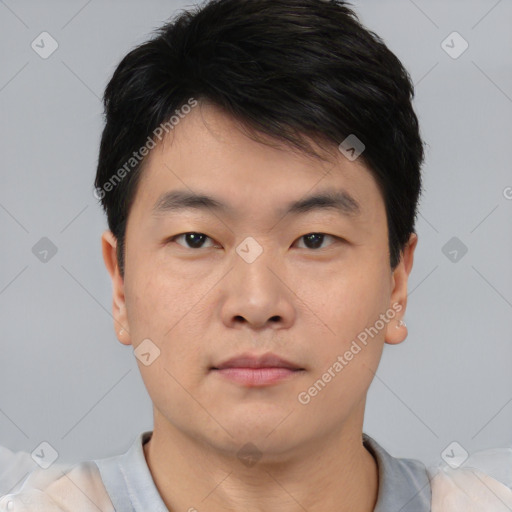 Neutral asian young-adult male with short  brown hair and brown eyes