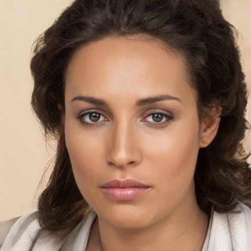 Neutral white young-adult female with medium  brown hair and brown eyes