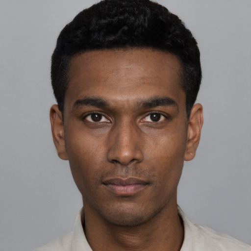 Neutral black young-adult male with short  black hair and brown eyes