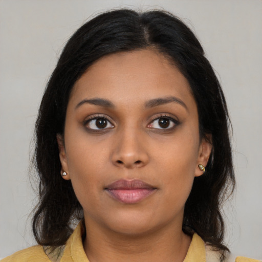 Neutral asian young-adult female with medium  brown hair and brown eyes