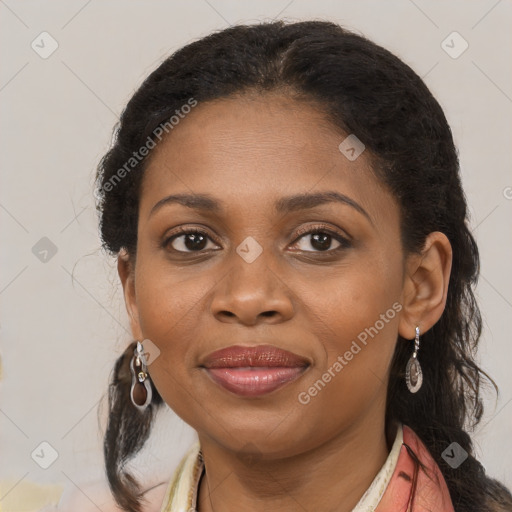 Joyful black young-adult female with medium  brown hair and brown eyes