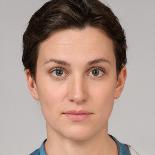 Neutral white young-adult female with short  brown hair and brown eyes