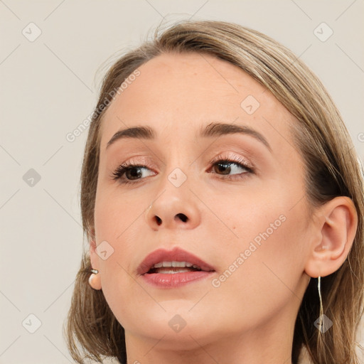 Neutral white young-adult female with long  brown hair and brown eyes