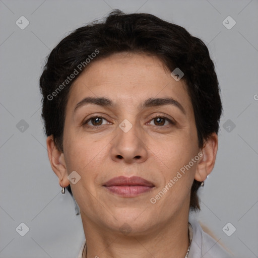 Joyful white adult female with short  brown hair and brown eyes