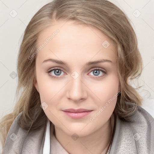 Joyful white young-adult female with medium  brown hair and blue eyes