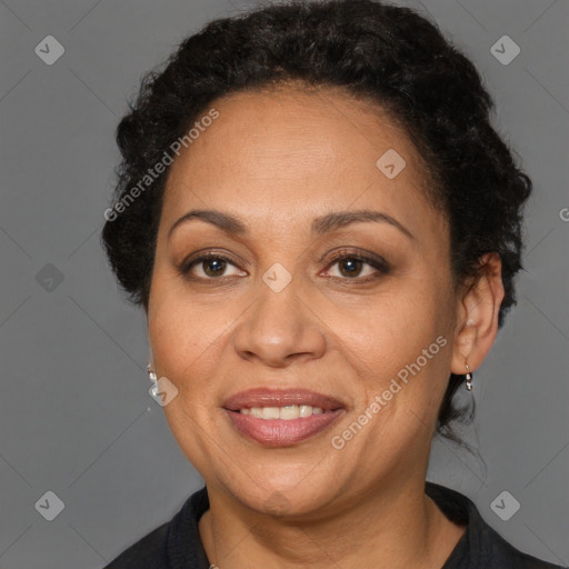 Joyful black adult female with short  brown hair and brown eyes