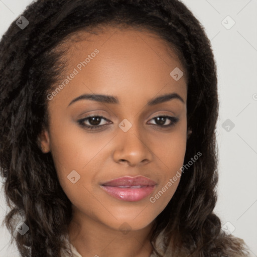 Joyful black young-adult female with long  brown hair and brown eyes