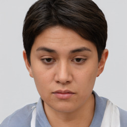 Neutral white young-adult female with short  brown hair and brown eyes