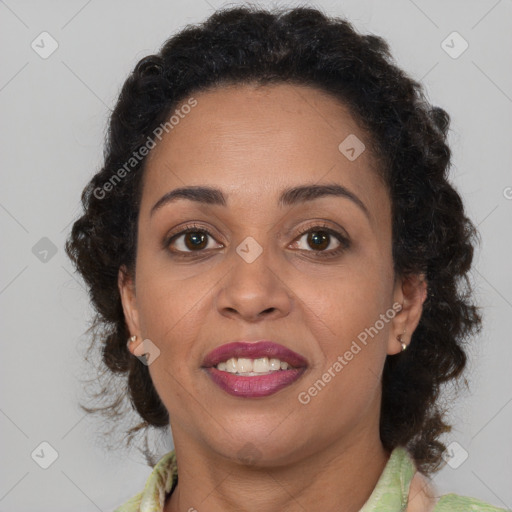 Joyful black young-adult female with medium  brown hair and brown eyes