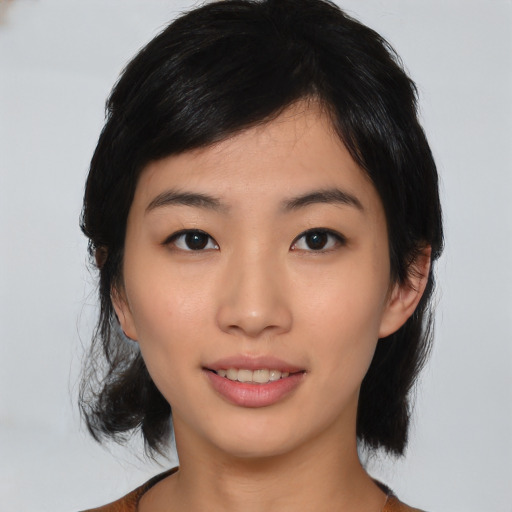 Neutral asian young-adult female with medium  black hair and brown eyes