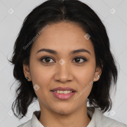 Joyful latino young-adult female with medium  brown hair and brown eyes