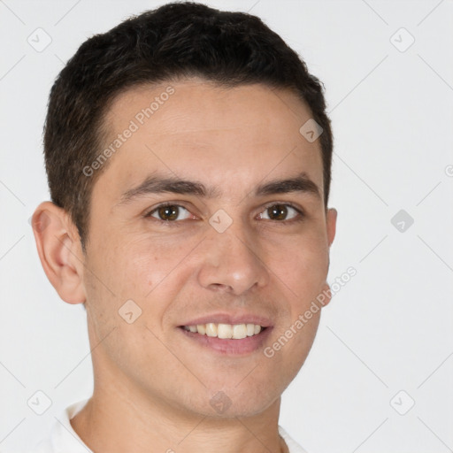 Joyful white young-adult male with short  brown hair and brown eyes