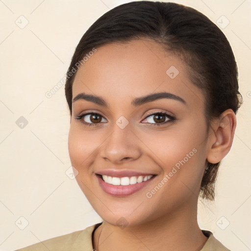 Joyful white young-adult female with long  brown hair and brown eyes