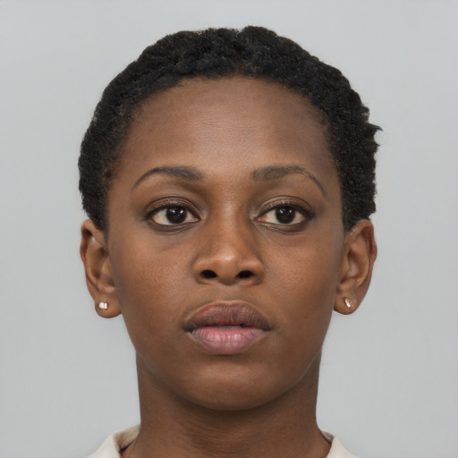 Neutral black young-adult female with short  brown hair and brown eyes