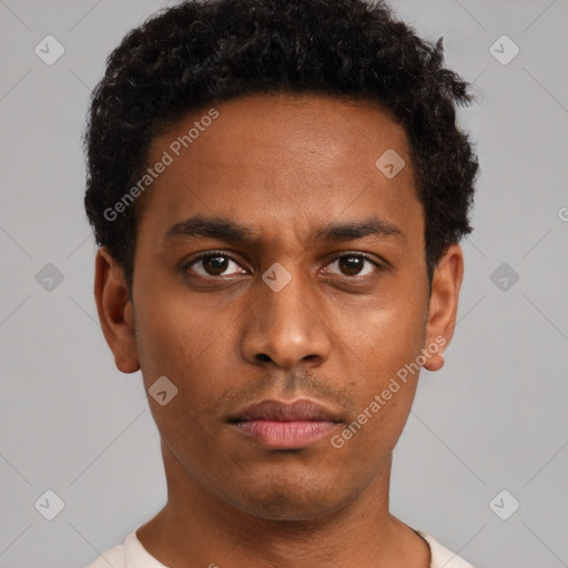 Neutral black young-adult male with short  brown hair and brown eyes