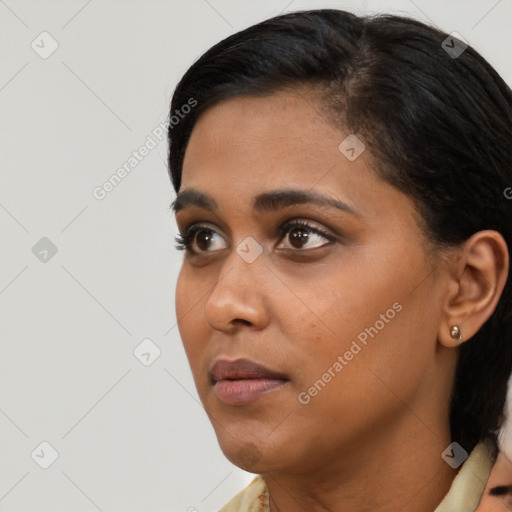 Neutral black young-adult female with short  black hair and brown eyes