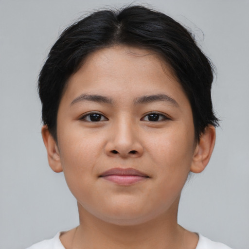 Joyful asian young-adult female with short  brown hair and brown eyes