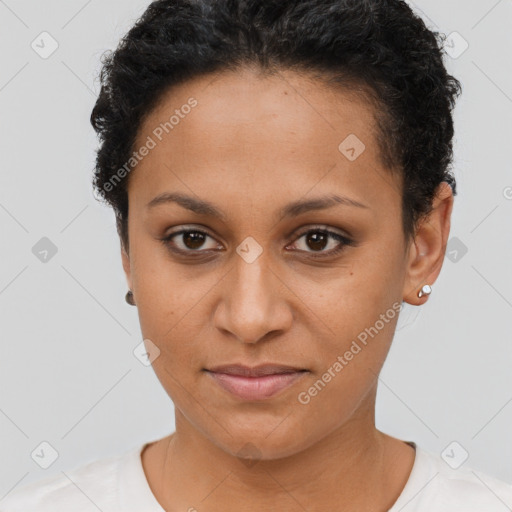 Joyful latino young-adult female with short  brown hair and brown eyes