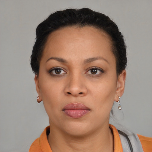 Neutral black young-adult female with short  brown hair and brown eyes