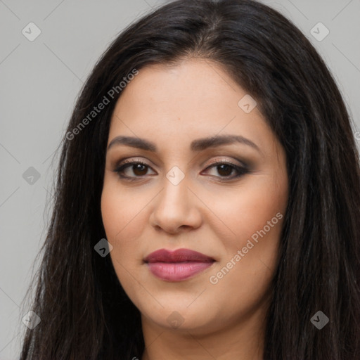 Joyful latino young-adult female with long  brown hair and brown eyes