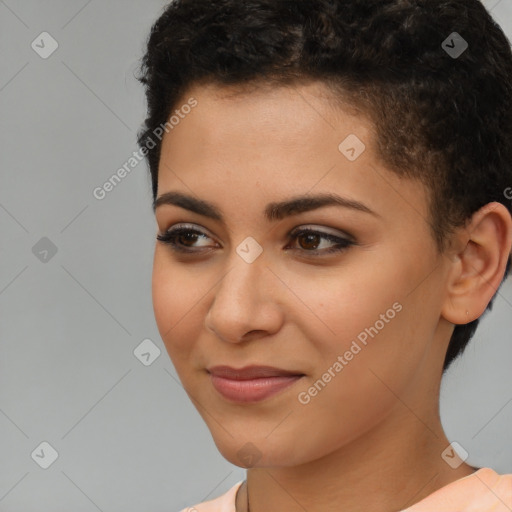 Joyful latino young-adult female with short  brown hair and brown eyes