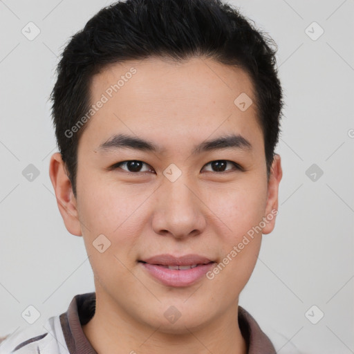 Joyful asian young-adult male with short  brown hair and brown eyes