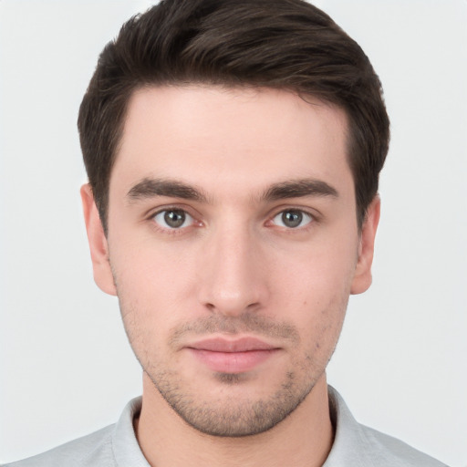 Neutral white young-adult male with short  brown hair and brown eyes