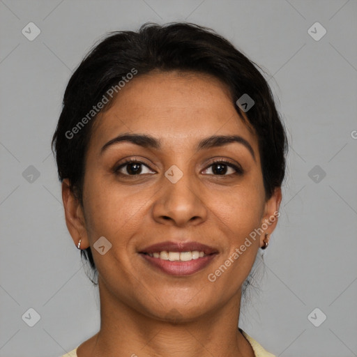 Joyful latino young-adult female with short  brown hair and brown eyes