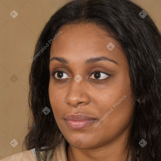 Joyful black young-adult female with long  black hair and brown eyes