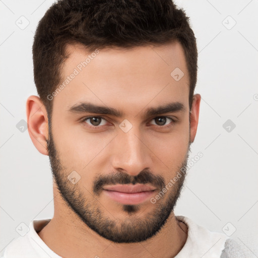 Joyful white young-adult male with short  brown hair and brown eyes