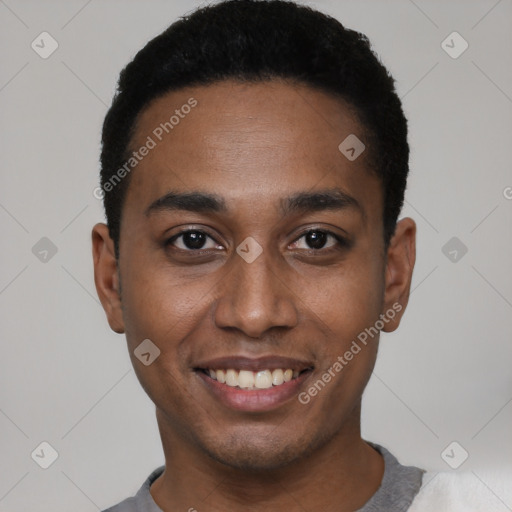 Joyful black young-adult male with short  black hair and brown eyes