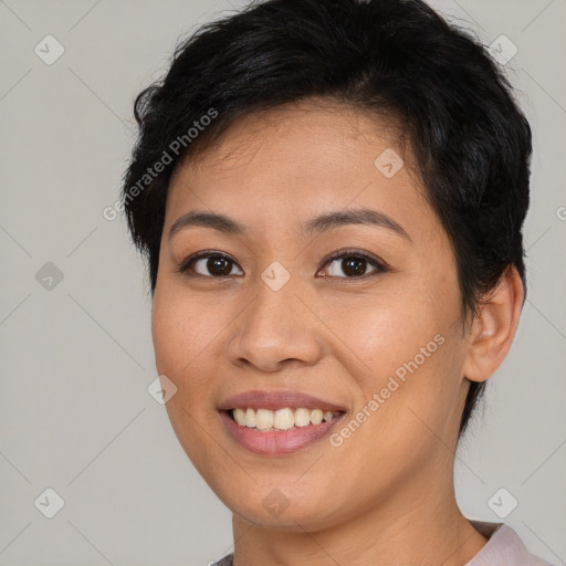 Joyful asian young-adult female with short  brown hair and brown eyes