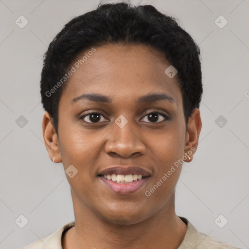 Joyful black young-adult female with short  black hair and brown eyes
