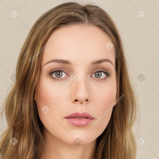 Neutral white young-adult female with long  brown hair and green eyes