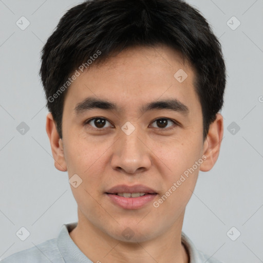 Joyful white young-adult male with short  black hair and brown eyes