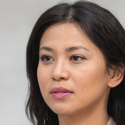 Neutral asian young-adult female with long  brown hair and brown eyes