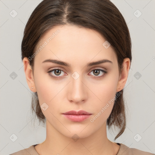 Neutral white young-adult female with medium  brown hair and brown eyes